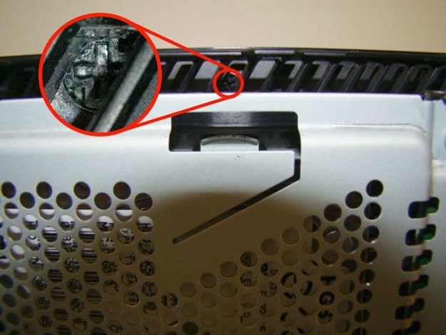 Here's the culprit. A tiny screw in the little slots along the side of the PS4