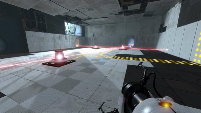Screenshot showing the iconic blue and orange portals in Valve's puzzle game, Portal.
